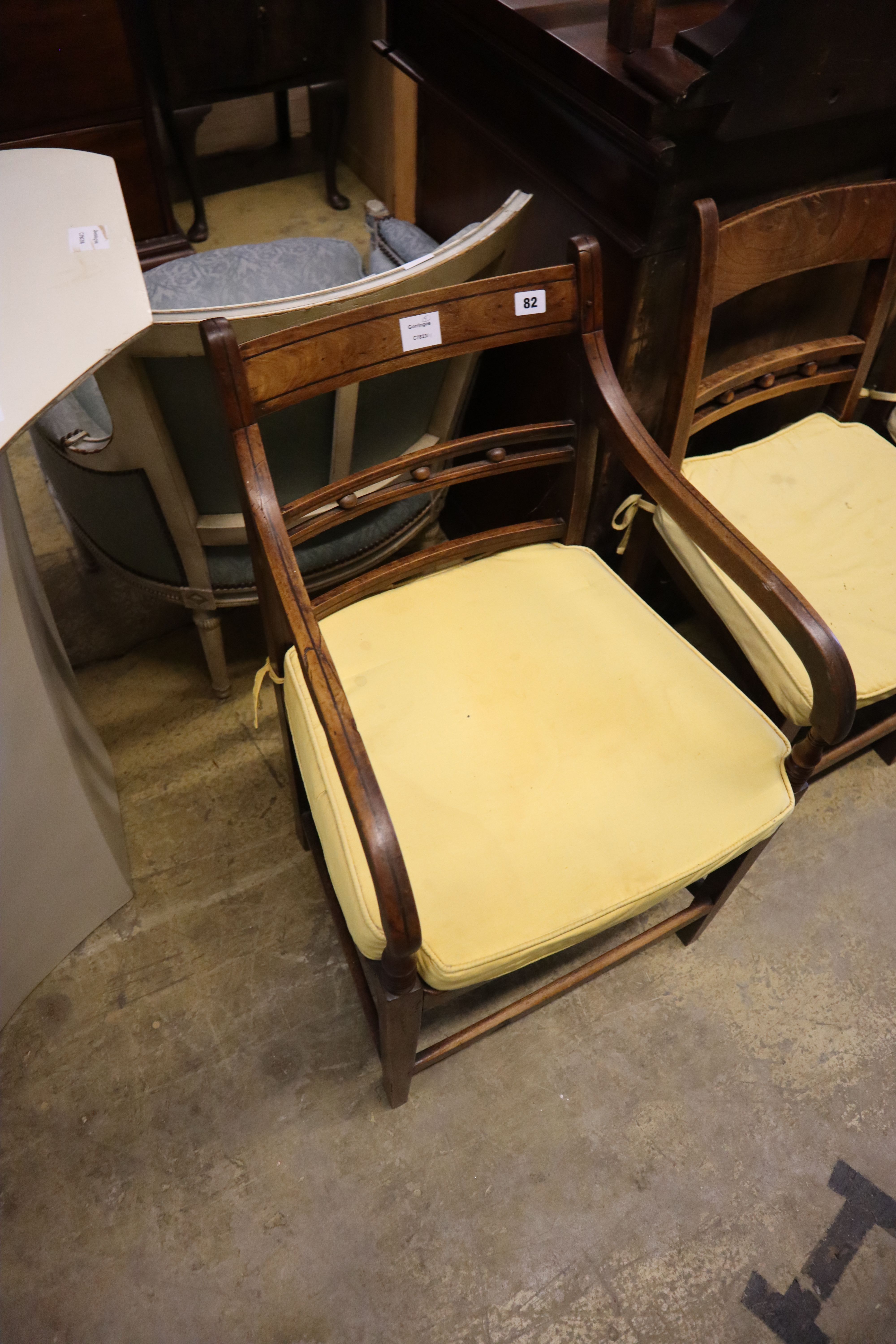 A harlequin set of 8 Regency elm and fruitwood dining chairs and a Regency elbow chair